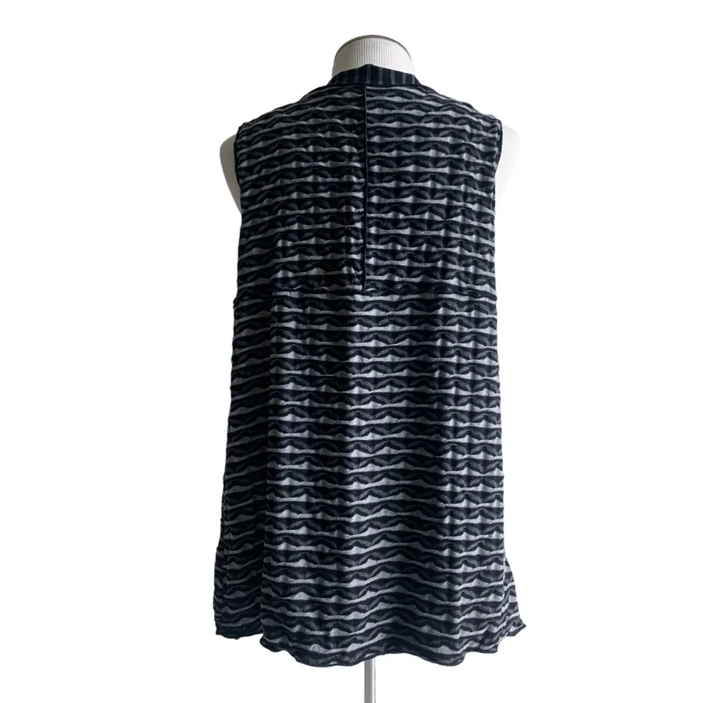 Apropos knit vest, black, gray geometrical jersey print adds warmth and layers M